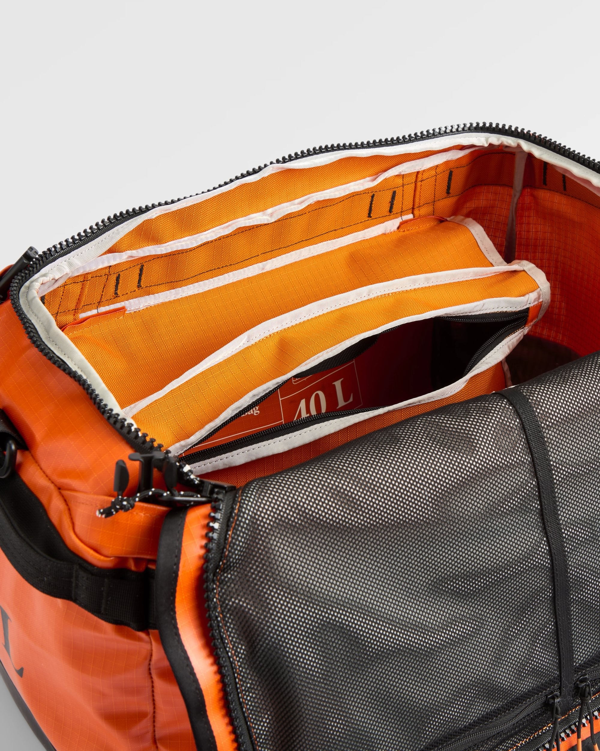 Roamer 40L Duffel Bag - Sunrise Orange - Flatlay
