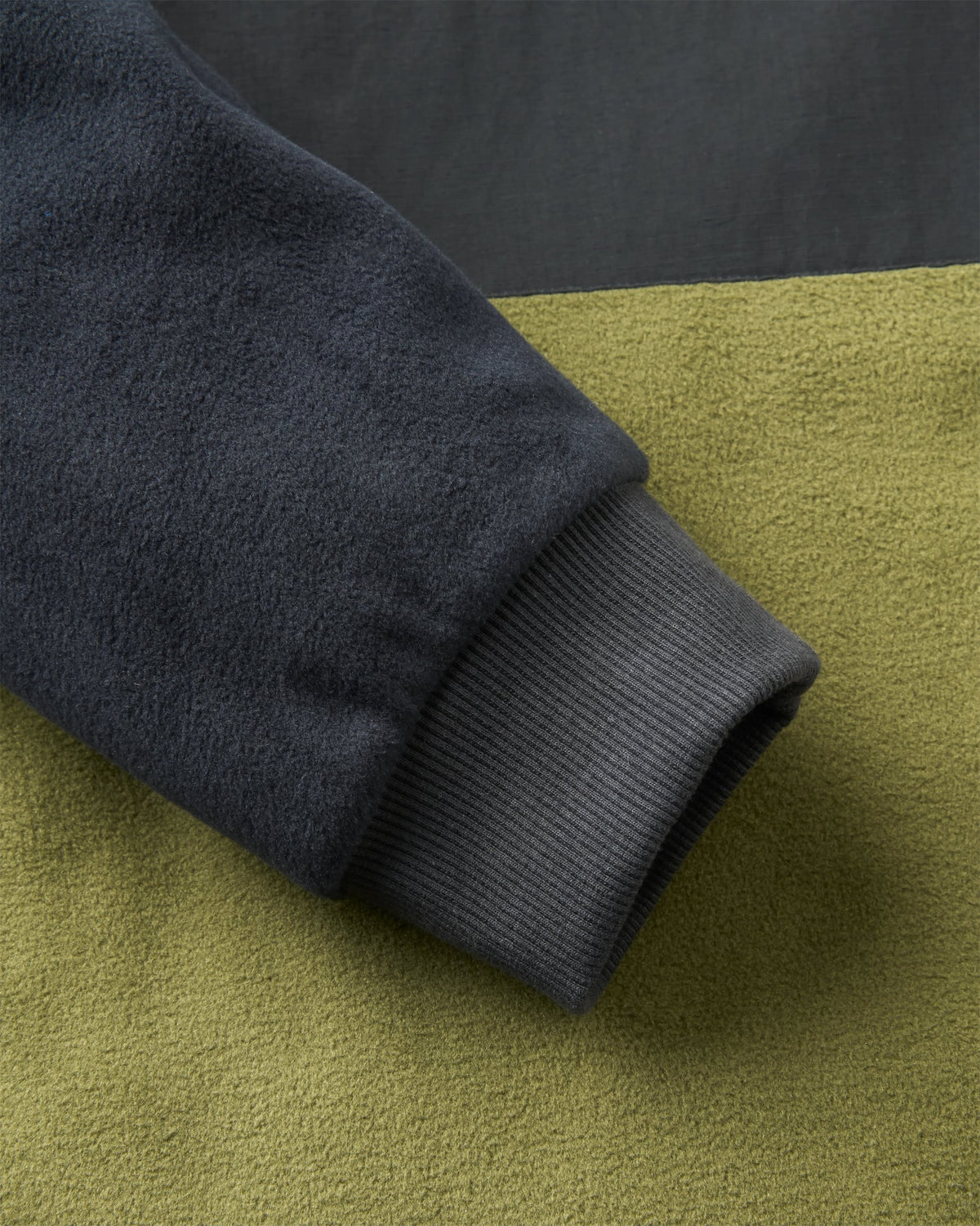 Woodland Hooded Polartec® Fleece - Black/Khaki - Flatlay