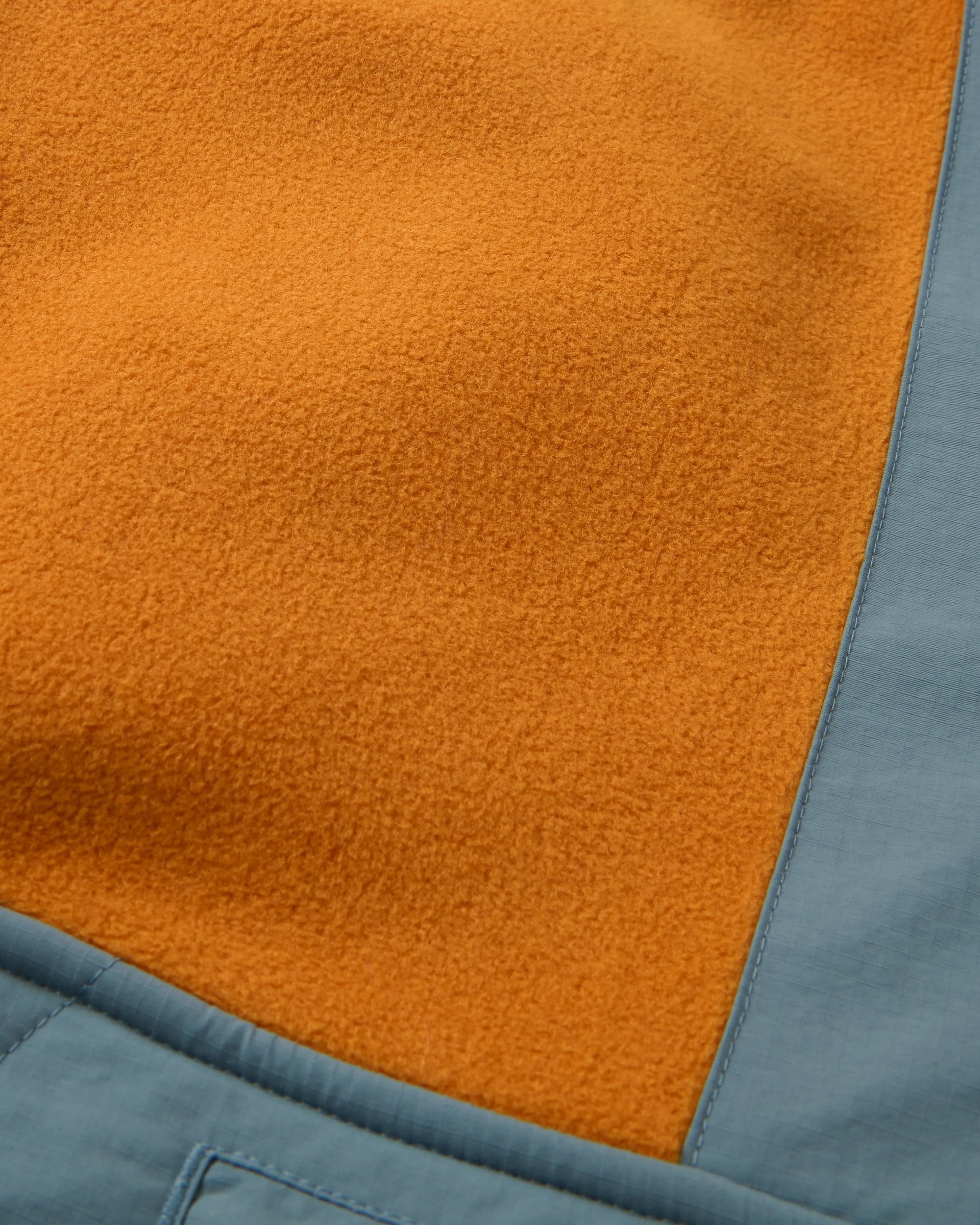 Woodland Hooded 1/2 Zip Recycled Polartec® Fleece - Retro Orange/Tidal Blue - Flatlay