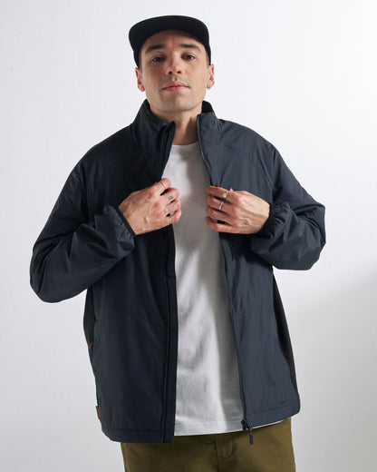 Daybreak Lightweight Recycled Thermore® Hoodless Jacket - Black - Studio Model