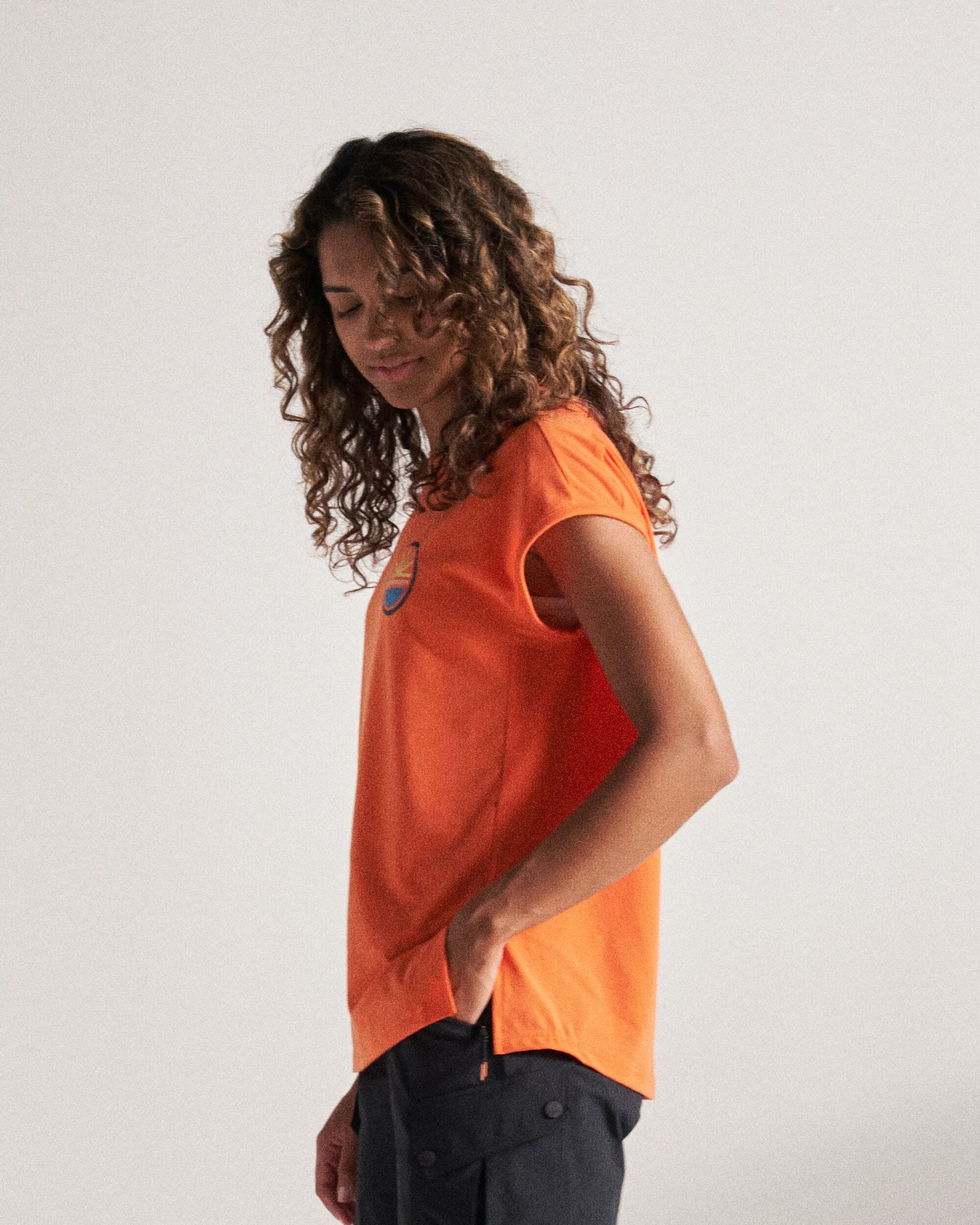 Chase The Light Drirelease® Active T-Shirt - Ember Orange - Studio Model