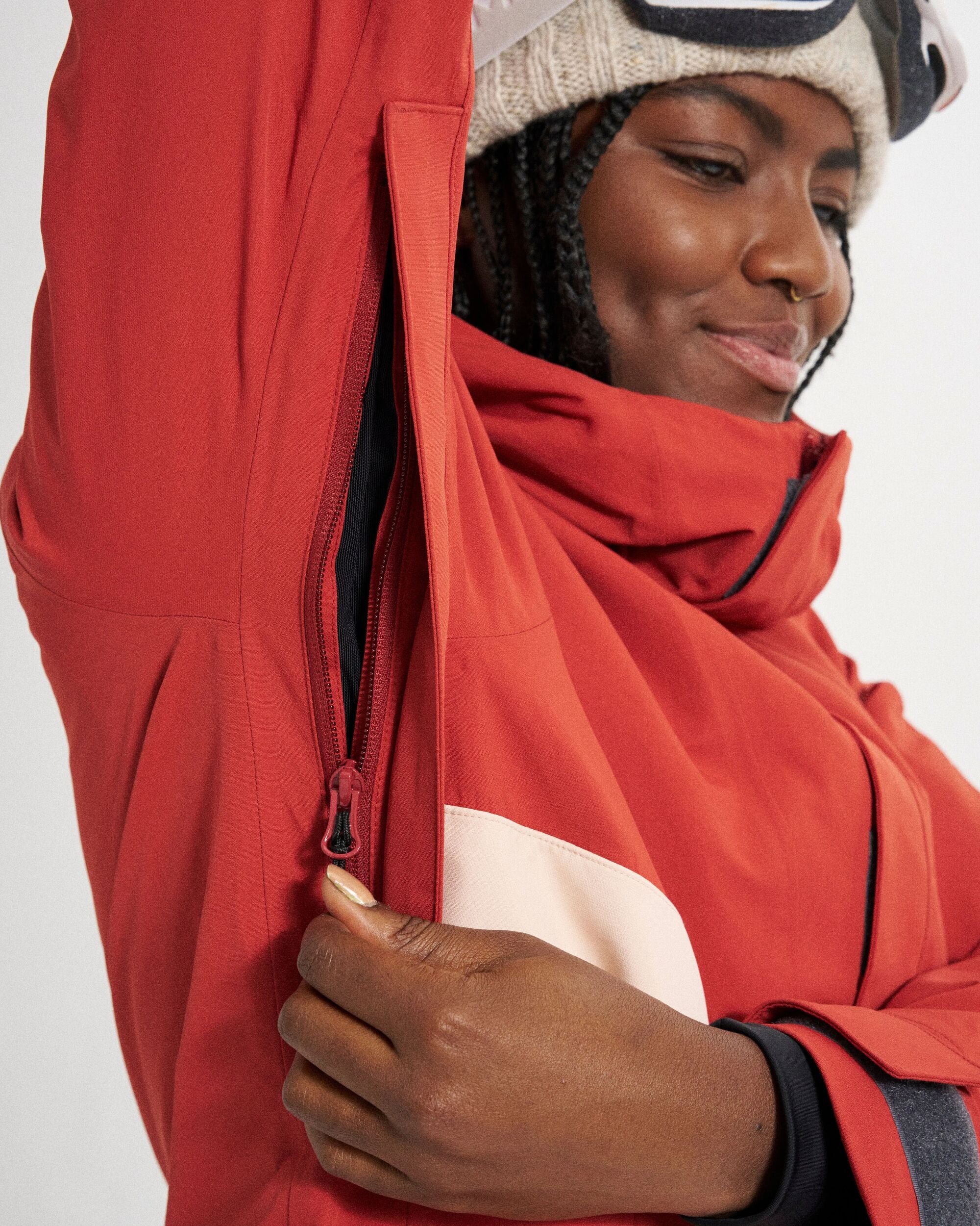 Snowscape Women's Recycled Anorak - Red Ochre - Studio Model