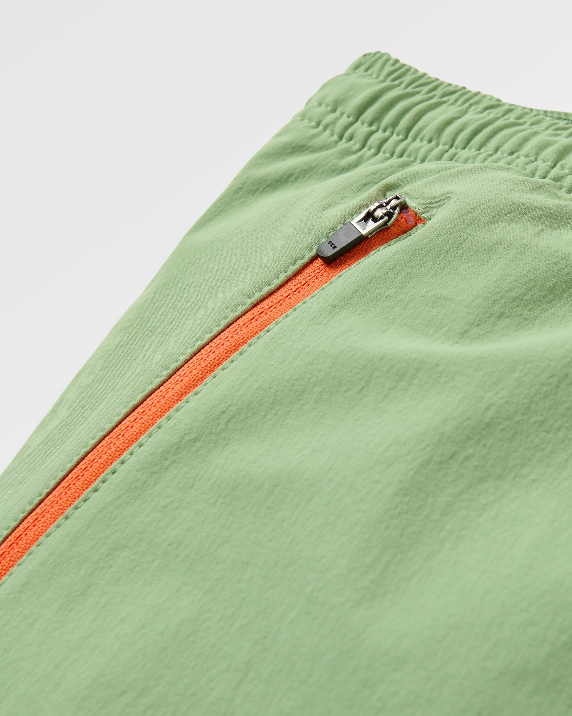 Flaris NetPlus® All Purpose Short - Stem Green - Flatlay